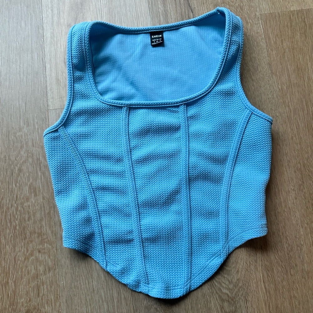Light blue top